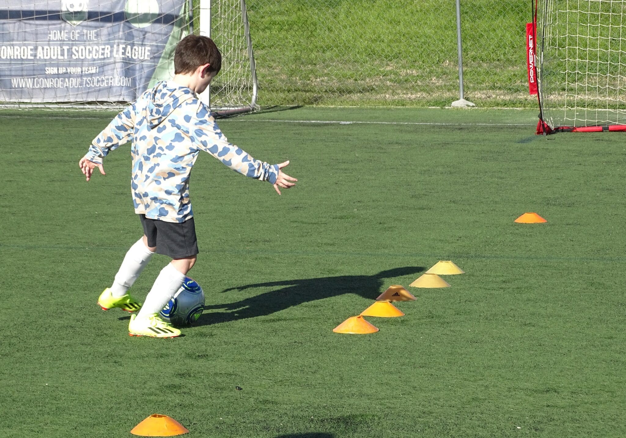 kid enjoying soccer camp